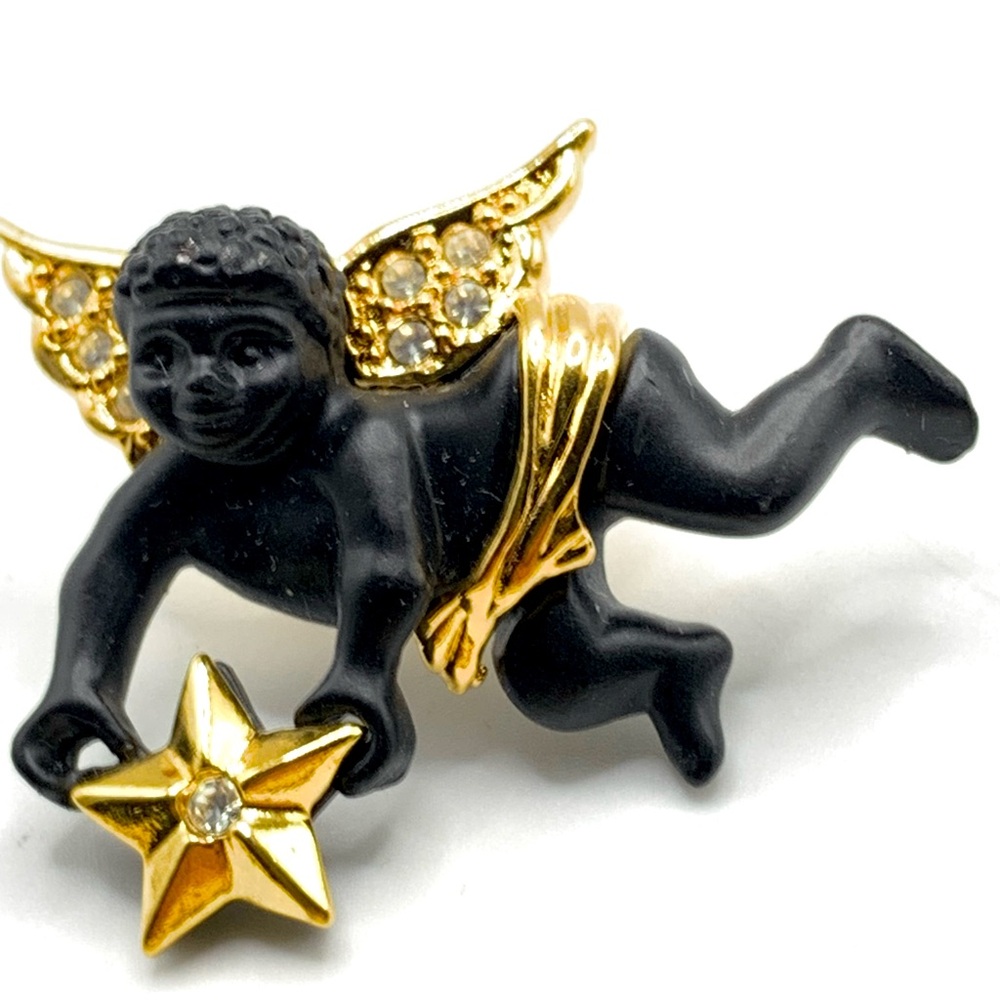 Beautiful signed Coreen Simpson designer Black and gold plated Angel clutch Pin